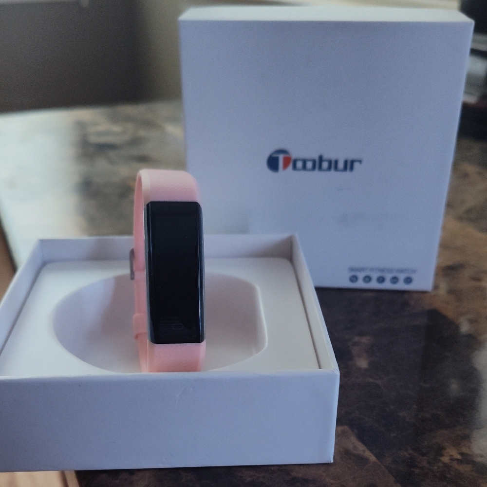 Sleek Pink Smartwatch with Slim Design and Dark Display